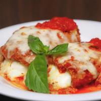 Eggplant Rollatini Entree  · Fresh battered eggplant rolled with seasoned ricotta, baked Parmigiana style with Marinara s...