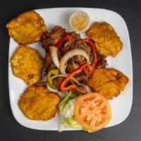 Griot Complete (Pork) · Fried pork. Marinated fried pork served with rice, plantains and salad.