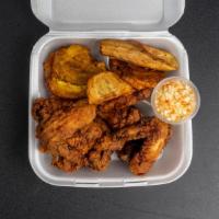 Zel Poule (  Whole Chiken Wings) · Plain, Buffalo or BBQ wings.  Served with fried  plantains and salad.