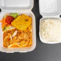 Kribish (Shrimp Creole ) · Whole shrimp creole .Served with fried plantains and rice and peas .
