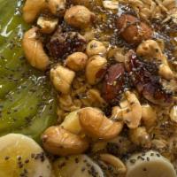 Healthy Style · Contains nuts. Kale, spinach, avocado, banana, and apple juice. Toppings granola, kiwi, bana...