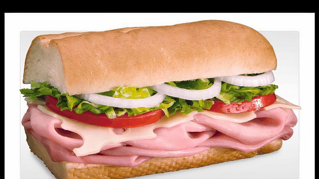 Ham & Swiss · Slow-cured ham and swiss made the BLIMPIE® WAY with tomatoes, lettuce, onion, vinegar, oil, and oregano.