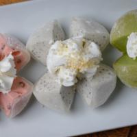 Mochi Ice Cream · Three pieces. Sweet sticky rice with an ice cream filling, your choices of green tea, red be...