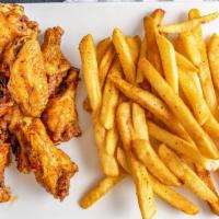 Chicken Wings · Tossed in Mild Buffalo sauce, BBQ, Sweet Thai Chili or Lemon Pepper with dressing and celery...