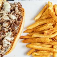 Philly · Thin-sliced Chicken Breast or Ribeye, grilled with onion, green pepper & Cheese, served on a...