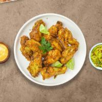 Lemon Pepper Wings Bender · Fresh chicken wings fried until golden brown, and tossed in lemon pepper sauce. Served with ...