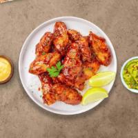 Honey Be My Bbq Wings · Fresh chicken wings fried until golden brown, and tossed in honey and barbecue sauce. Served...