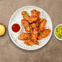 Power Of The Sweet And Sour Wings · Fresh chicken wings fried until golden brown, and tossed in sweet and sour sauce. Served wit...