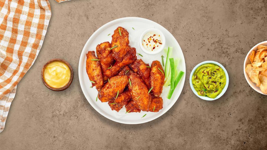 Clucking Wings · Fresh chicken wings fried until golden brown. Served with a side of ranch or bleu cheese.