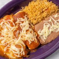 - One Enchilada, One Chile Relleno, Rice And Beans · 