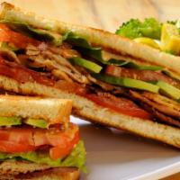 Balt Sandwich · Applewood bacon, avocado, lettuce, and tomatoes with aioli on toasted white bread.