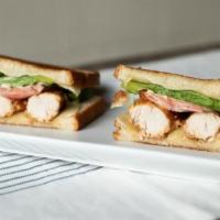 Grilled Chicken Sandwich · Lettuce, tomatoes, provolone, and aioli on grilled white bread.