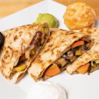 Veggie Quesadilla Plate · Grilled veggies, black beans, corn, pepper jack, and provolone. Served with avocados and sou...