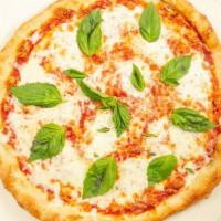 Margherita Pizza · Fior di latte mozzarella, tomato sauce, basil, olive oil.