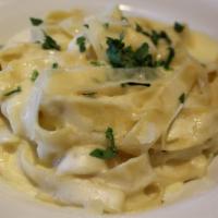 Fettuccini Alfredo · Parmesan cheese, light cream sauce.