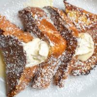 Original French Toast · Thick sliced homemade bread dredged in egg batter and lathered with our sweet whipped butter...