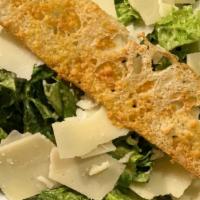 Caesar Salad · Romaine lettuce, caesar dressing, focaccia toast crouton, and grana padano Italian cheese. A...