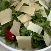Arugula Salad · Arugula, basil, Truffle Oil, and Parmigiano