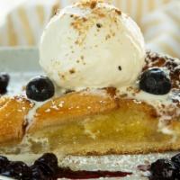 Almond Apple Tart · A la mode, vanilla ice cream.