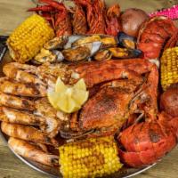 Seafood Platter (Large) · Snow Crab, Whole Shrimp, Crawfish, Mussels, Clams, Corn, and Potatoes, (not sold by the poun...