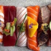 Sushi Deluxe Combo · 10 pcs of sushi nigiri (chef choice) & one spicy tuna roll