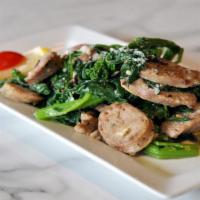 Broccoli Rabe & Sausage · Garlic, cherry peppers, and olive oil.