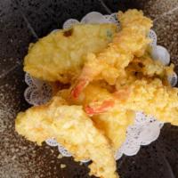 Tempura · Deep fried shrimp and vegetables with house sauce.