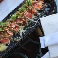 Beef Tataki · Thinly sliced seared beef served with house sauce. 
**Disclaimer: Consuming raw or undercook...