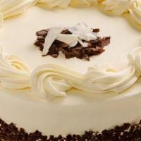 Midnight Cake Slice · Three layers of chocolate buttermilk cake filled with a silky rich white chocolate mousse.