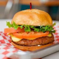 Veggie Burger · Special Vegetable patty flame-grilled with our special sauce, cheese, lettuce onion and toma...