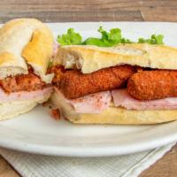 Croqueta Sandwich · Croquette, ham, and swiss cheese on a cuban bread.

Platos marcados con asterisco no pueden ...