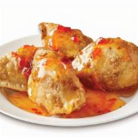 Fried Chicken Dumplings · 4 dumplings | Chicken wrapped in savory dough, served with sweet chili sauce