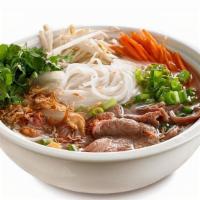 Thai Soup · A fragrant Thai chicken broth filled with rice noodles, bean sprouts, onion, carrot, green o...