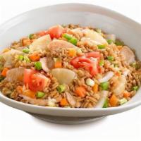 Thai Fried Rice · Thai Fried Rice with choice of protein, eggs, onion, carrot, green onions, pineapple and tom...