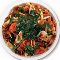 Drunken Noodles · Large rice noodles, egg, Chinese broccoli, bell pepper, onion, carrot, baby corn, Thai basil...