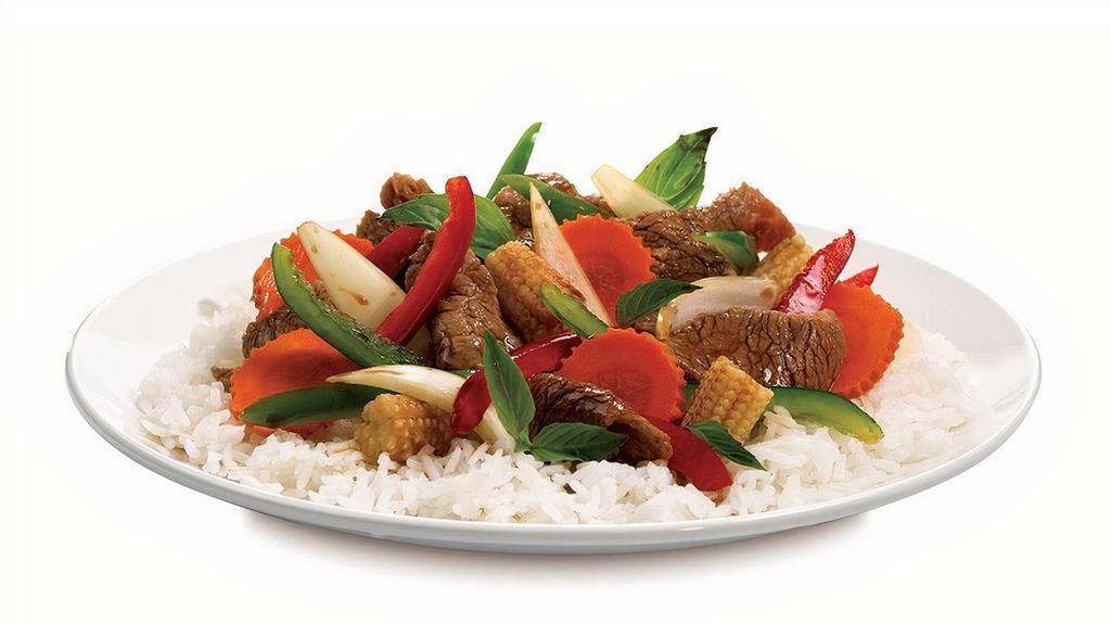 Basil Stir Fry · Fresh Thai basil, baby corn, carrots, bell pepper and onions wok-tossed in our signature stir-fry sauce served on steamed rice or crisp lettuce with your choice of Shrimp, Beef, Chicken, Vegetables or Tofu