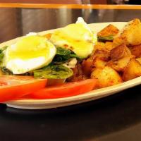 Eggs Florentine With Spinach · All served with a side of home fries or tomato eggs cooked to order.