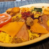 Danny'S International Omelette · Ham, sausage, bacon, tomato, onion, peppers and mushroom.