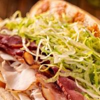 #15 Chipotle Turkey Club · OVENGOLD® Turkey Breast, Applewood Smoked Bacon, Swiss, Lettuce, Tomato and Chipotle Mayo