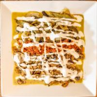 Queso Morelos · Grilled queso fresco served gonna bed of tomato cream salsa topped with chorizo, rajas, mush...