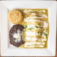Enchiladas Verdes · One of our top selling dishes! Three corn tortillas filled with shredded chicken covered in ...
