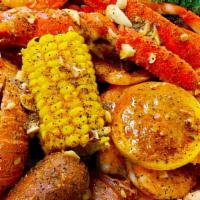 Combo 4 (1/2 Lb) · 1/2 lb shrimp (head off),9-10 oz  snow crab, 1 piece lobster tail, 2 corn, 2 potato,2  egg