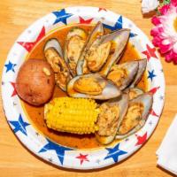 1/2 Lb Green Mussel · Seafood served with 1 corn and 1  potato.
