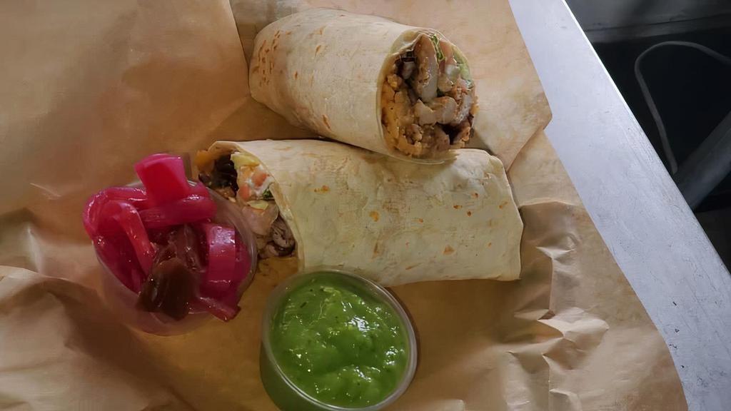 Burritos · Homemade flour tortilla wrap filled with rice, bean, lettuce, tomatoes, avocado, sour cream, cheese and your choice of steak, chicken, shrimp
