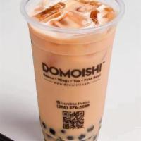 House Milk Tea · Premium house blends black tea with cream with topping comes with honey boba