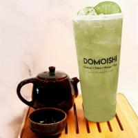 Four Season Green Tea · Hand brewed green tea, topped with fresh fruit.