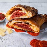 The Pepp Calzone · Loaded with pepperoni, and mozzarella. Served with choice of dipping sauce.