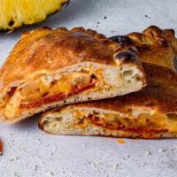 Pepps And Pineapple Calzone · Pepperoni, pineapple, and mozzarella. Served with choice of dipping sauce.