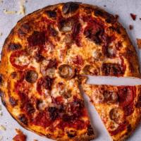 Meat Lover’S Pizza 10” · Tomato sauce, mozzarella, pepperoni, sausage, ham, and bacon.