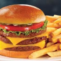 Triple Huddleburger · Our classic triple burger, melted aged cheddar cheese, lettuce, tomato and pickle chips (Cal...